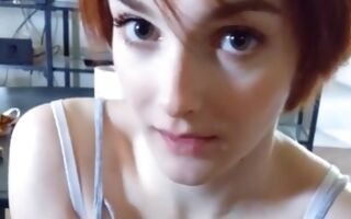 Red-haired whore blowing off a massive and tasty dick